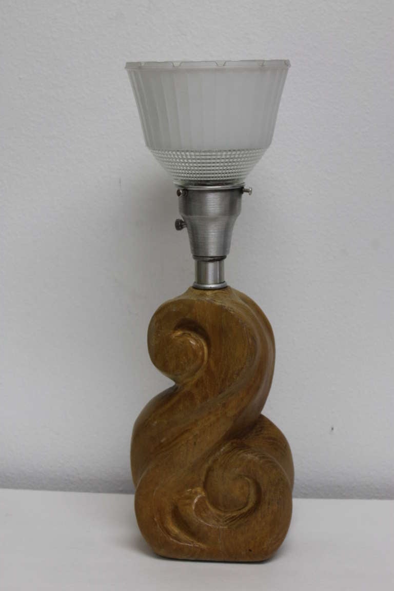 Russel Wright table lamp. These came in terra cotta and wood. There's one pictured in Ann Kerr's book, Collector's Encyclopedia of Russel Wright, Third Edition, page 114. Part of a wood line designed by husband and wife Industrial designers Russel