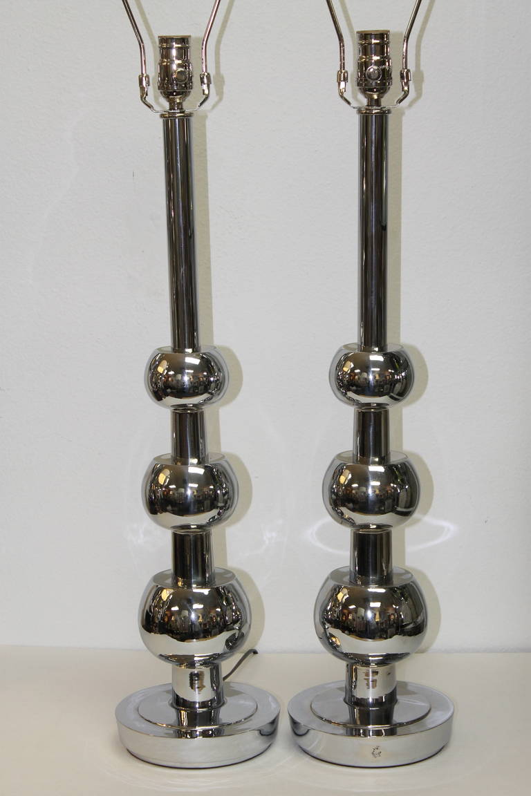 Chrome table lamps by Stiffel, circa 1960s. Lamps were originally brass and we had them re-chromed. Lamps are professionally rewired.  Total height from base to the top of socket is 27 inches.   Lamp shades not included.

Stiffel lamps are the