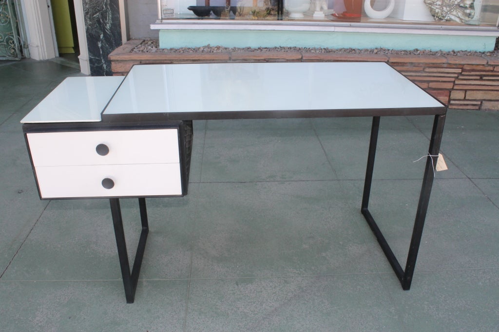 Knoll + Drake desk with original painted glass tops.   Signed in each drawer with the early big K for Knoll and the D for Drake.  Chair is included which is pictured below.