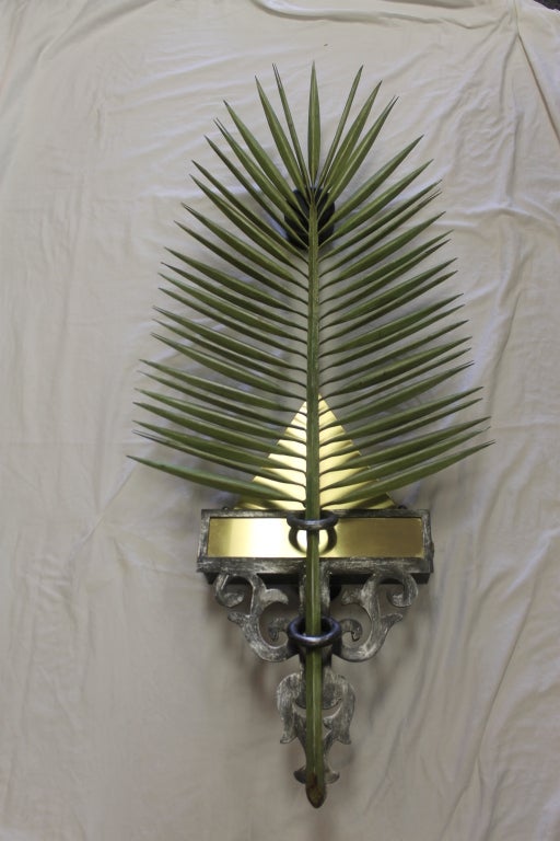 Pair of palm frond wall sconces most likely from a hotel.  They both have been rewired.