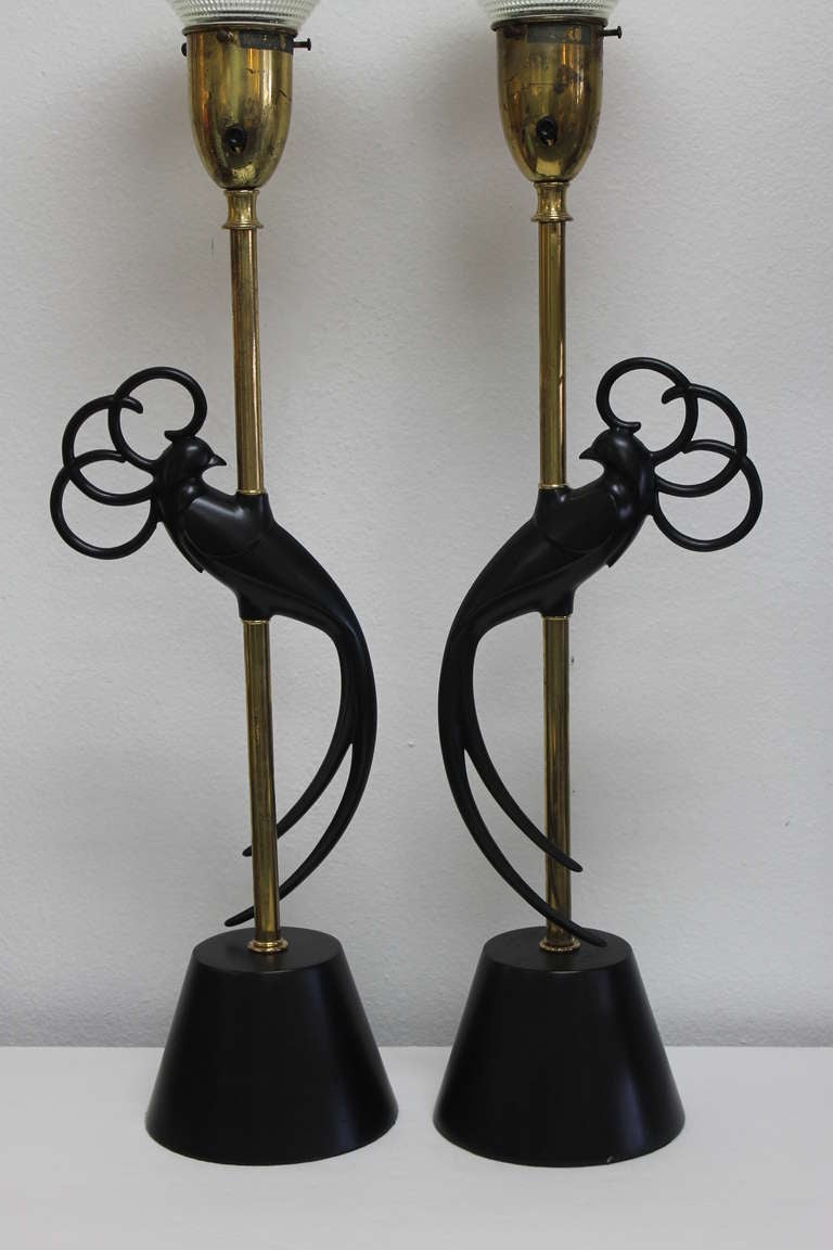 Pair of lovebird lamps by the Rembrandt.Lamp Company  Lamps have been newly rewired and wood bases have been replaced to match original bases.  Lamps measure 30.5
