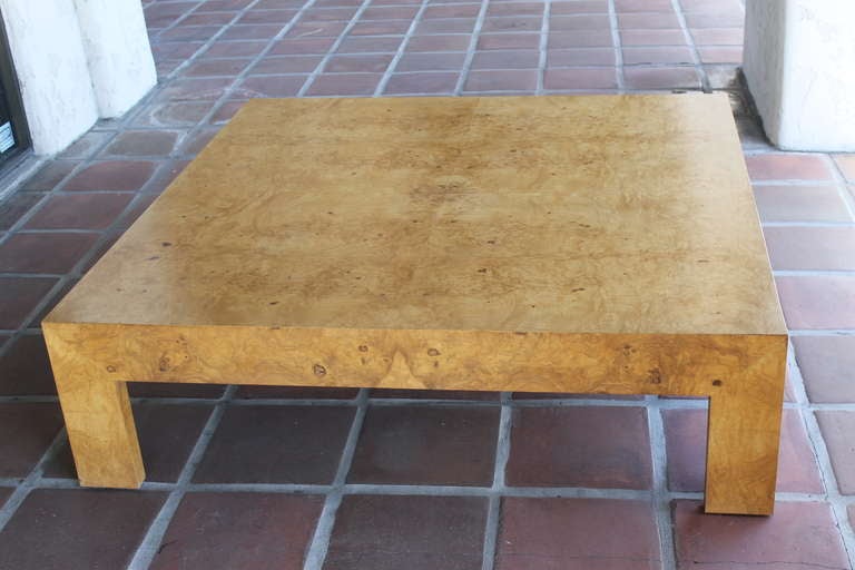 Monumental Milo Baughman burlwood coffee table.  Measures 54