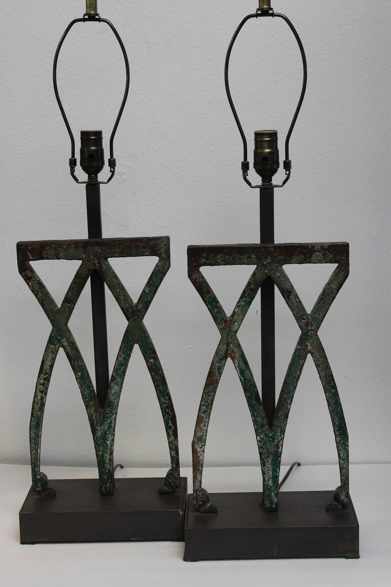 Pair of lamps that contain Art Nouveau metal work. Someone turned them into a great pair of lamps. Measure: Metal work is 15