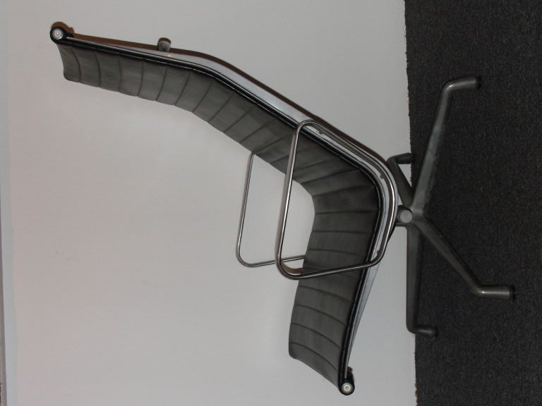 Ray & Charles Eames aluminum group chair & ottoman