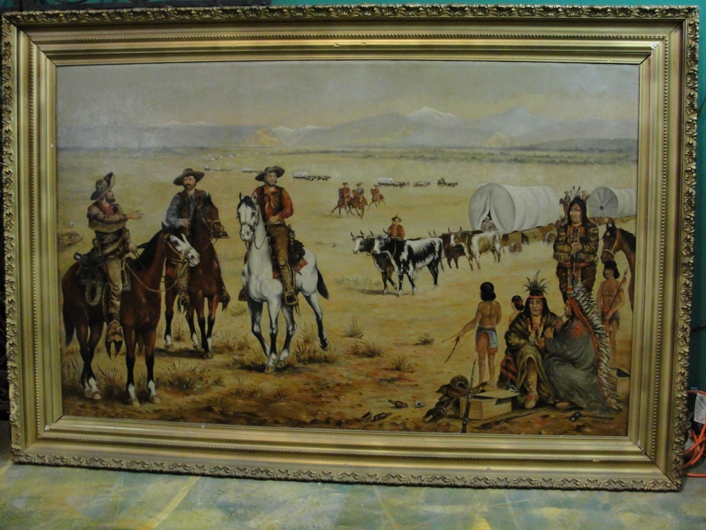 Monumental oil painting depicting a wagon train, cowboys and indians.  Signed G.W. Bown.