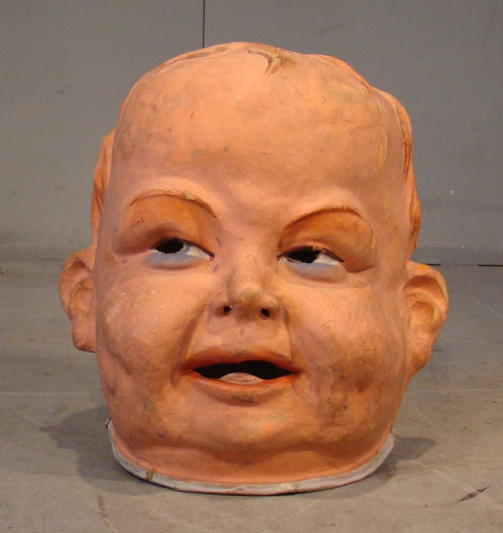 Old big carnival mask in painted paper