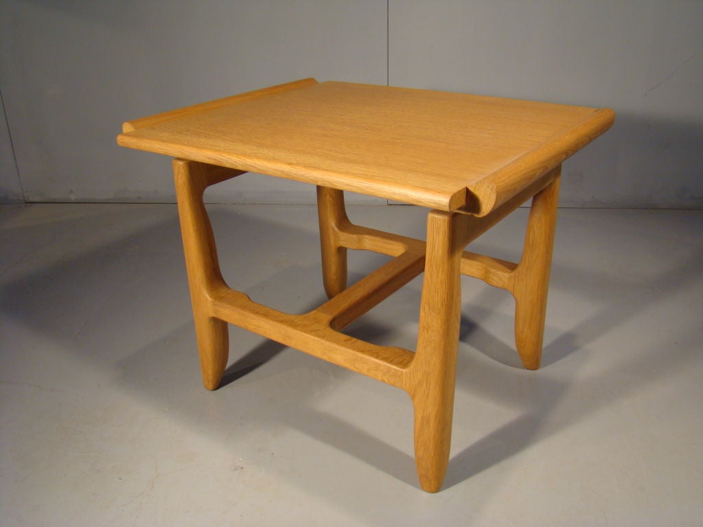 GUILLERME ET CHAMBRON AN rare oak side table