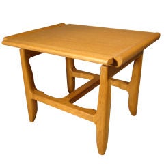 GUILLERME ET CHAMBRON AN rare oak side table
