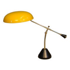 BRASS AND LACQUERED METAL ADJUSTABLE TABLE LAMP