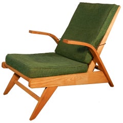 1950 armchair by Gustave Gautier