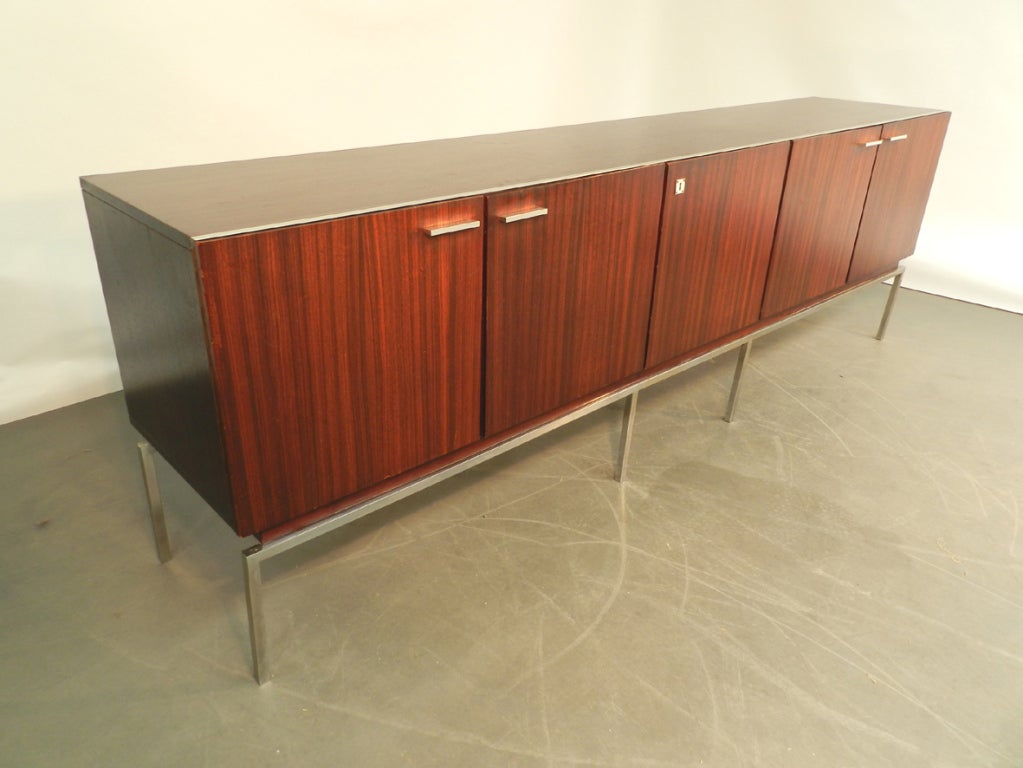 1970 Veneering  mahogany and chromium metal sideboard.