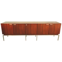1970 Veneering  mahogany and chromium metal sideboard.