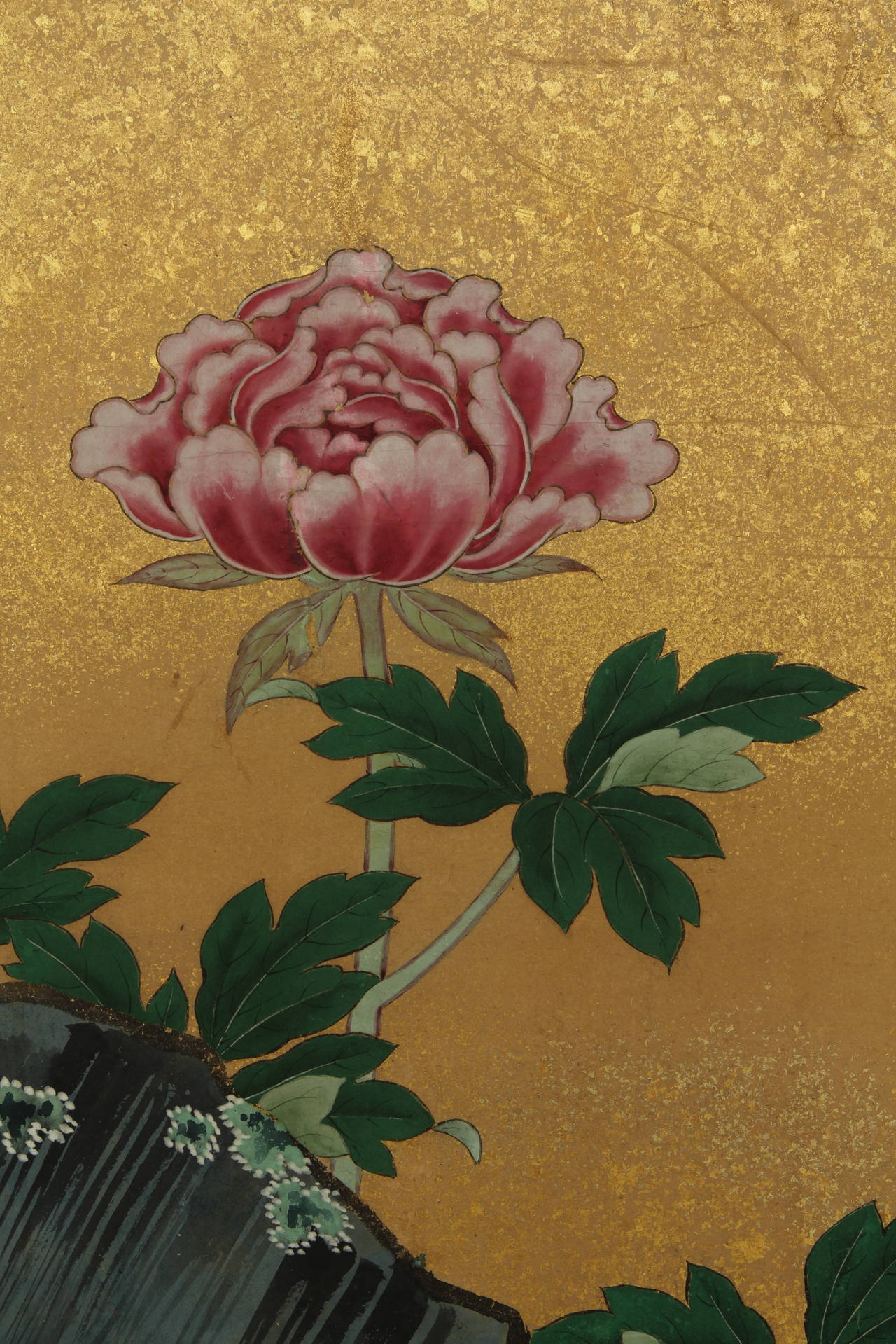 Four-panel folding screen with painting in ink and mineral colors on paper with gold leaf of a bird and peony flowers by rocks.