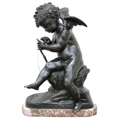 A Nineteenth Century French Bronze Statue of a Putti