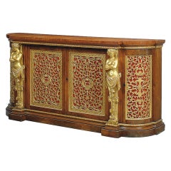 A Nineteenth Century Amboyna and Carved Giltwood Sideboard