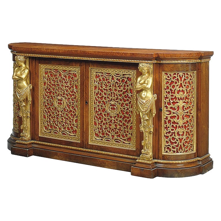 A Nineteenth Century Amboyna and Carved Giltwood Sideboard For Sale