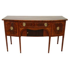 A Mahogany and Crossbanded Bowfront Sideboard