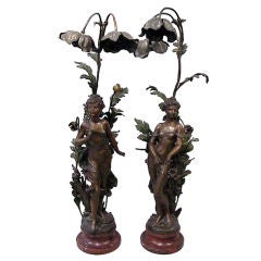 A Pair of Patinated Figural Lamps