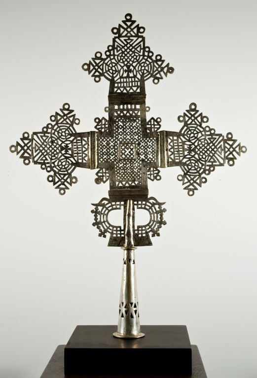 Functioning as a positive,protective force, the Ethiopian processional cross reveals Ethiopia's rich, complex history.  Eastern art patterns lay the groundwork for the crosses' ornate designs.  Beautifully and meticulously created, cross design