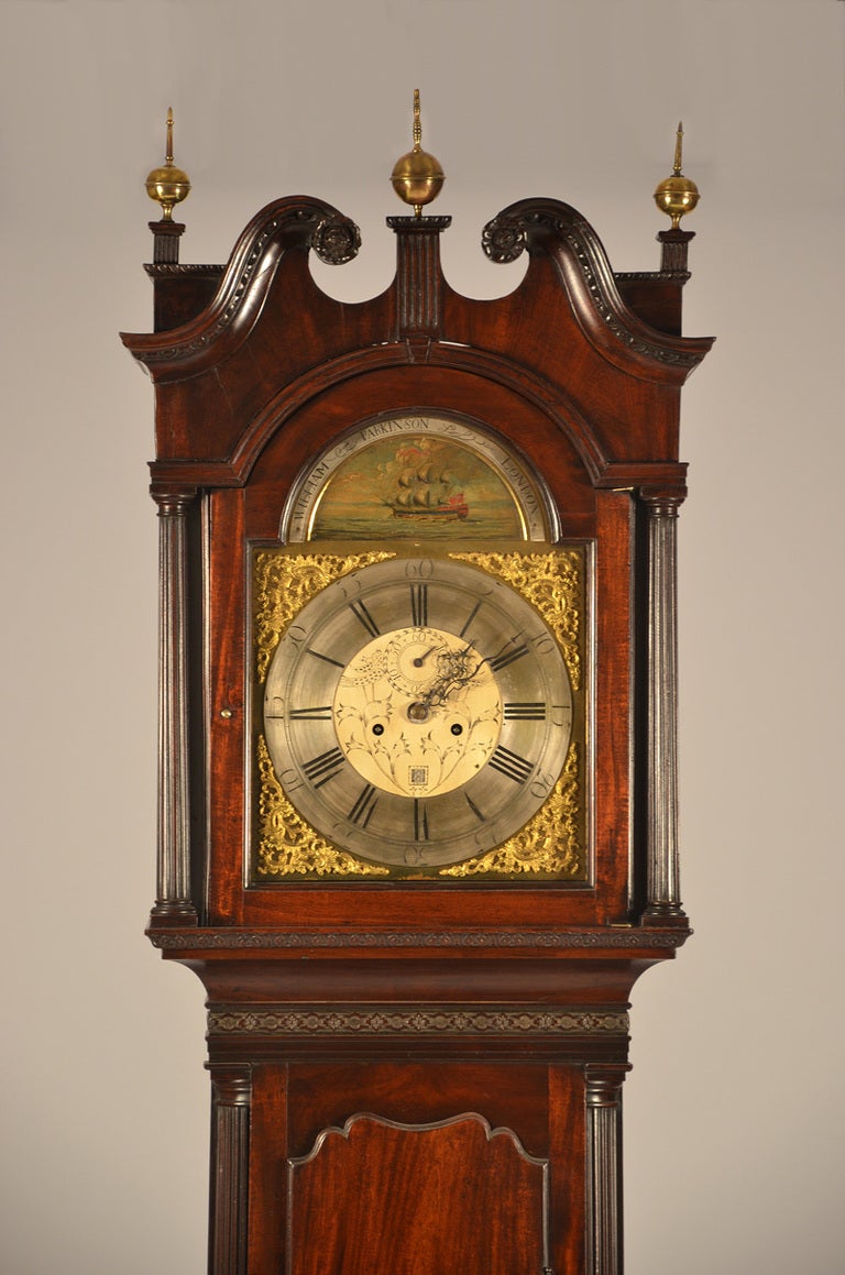 Superb Chippendale George III London tallcase clock with “quoined” rustication on the base corners and as plinths under the applied quarter columns.   Highly figured mahogany, excellent carving  and great form.  The pendulum,  weights and 8-day time