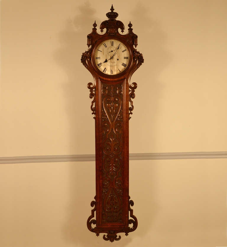 Wonderful huge English carved oak wall clock by, “ G. Smith, Leamington”.
The Baroque-inspired case dated and monogrammed 