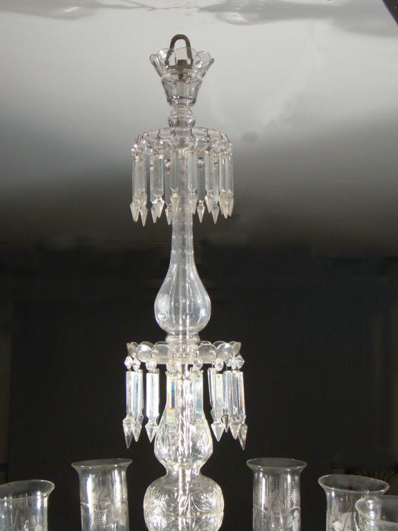 Wonderful Glass crystal 12-light chandelier with original etched hurricane shades. One of the shades is etched 