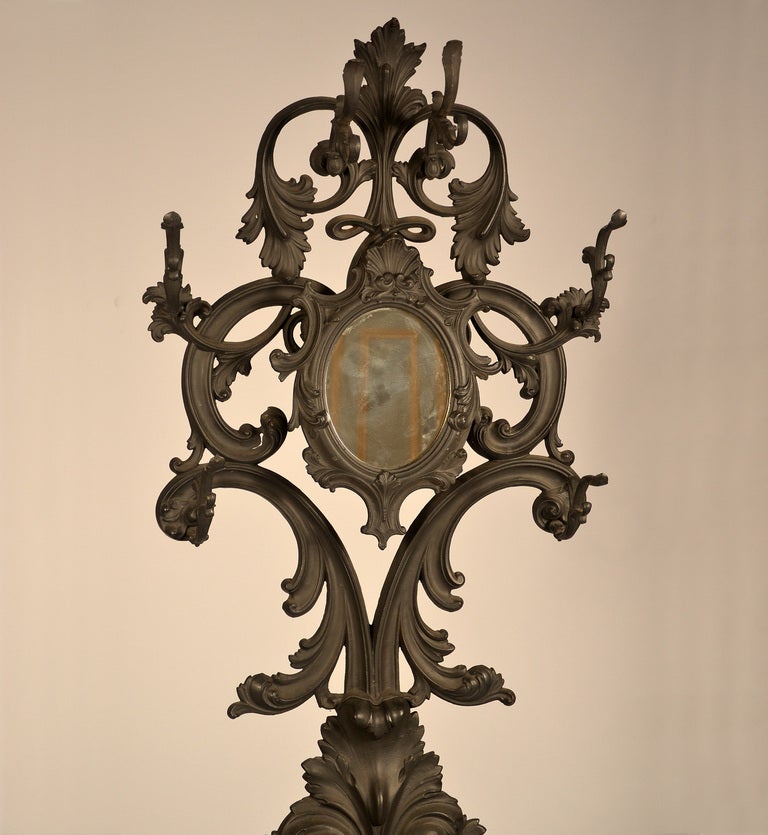 Excellent New York cast Iron hall tree formed of acanthus leaves and “C” scrolls.
Very bold with wonderful curves.

(signed under removable drip pan) 