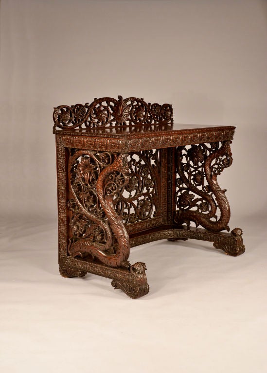 Wonderful Indo/Portuguese rosewood console with superb carving detail in remarkable original condition.<br />
<br />
This console would have been a revered piece in a large house. Rosewood is quite dense which helps account for the perfect