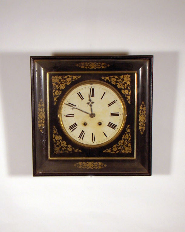 Wonderful French square bakers clock in superb condition.<br />
<br />
All the gold stenciling of this square bakers clock is perfect, it runs and strikes. This square clock has the ogee square frame shape. The front door hinges at the top.