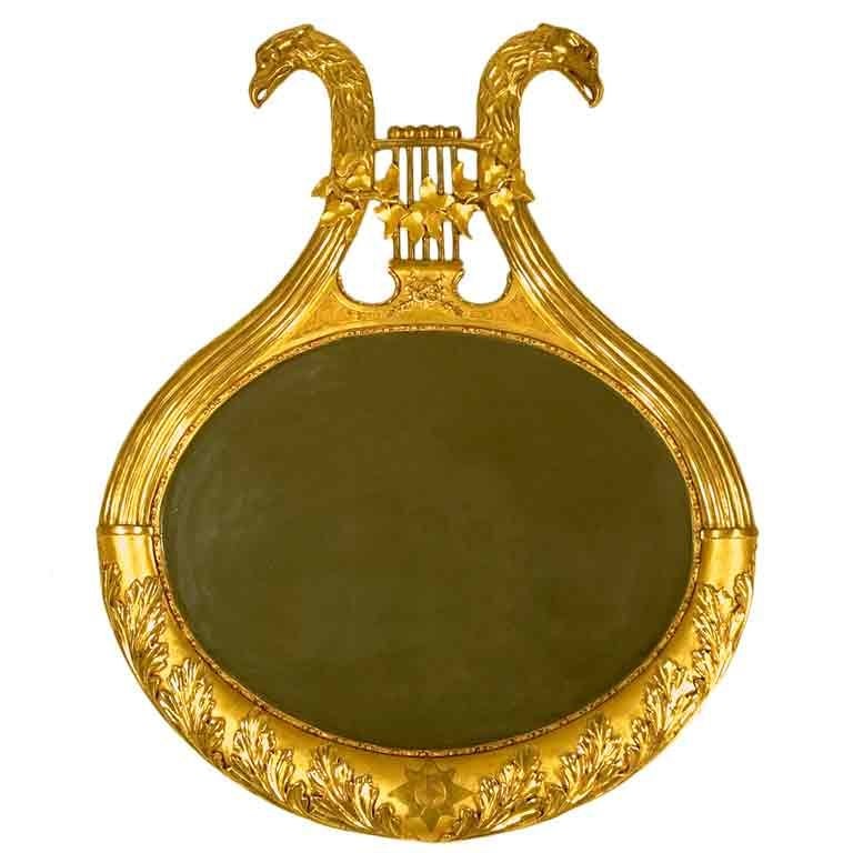 Oval Gilt Mirror with Eagles For Sale