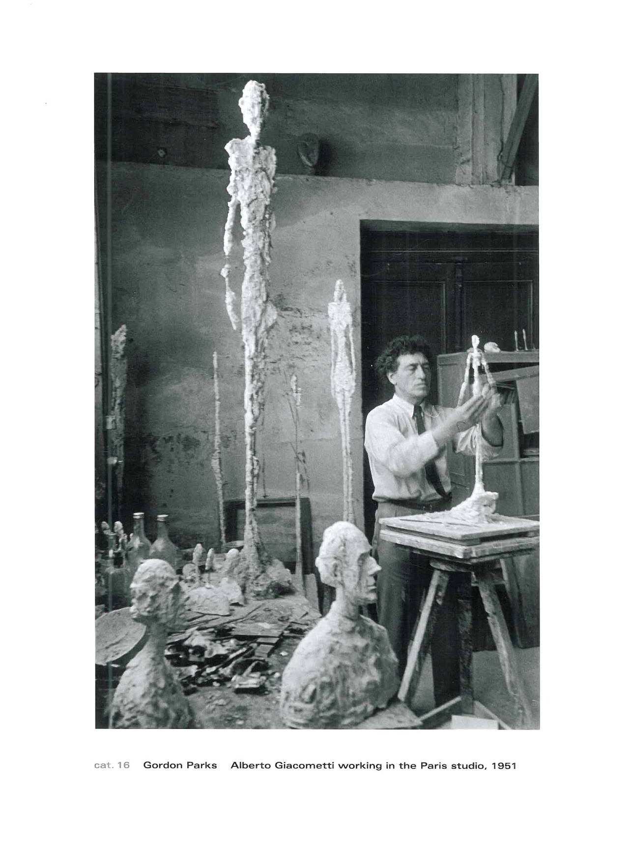 Hardback book with dust jacket published in 2011 to accompany an exhibition which features these unknown photographs and drawings of the life and works of Alberto Giacometti. A collection of wonderful black & white photographs of the artist and some