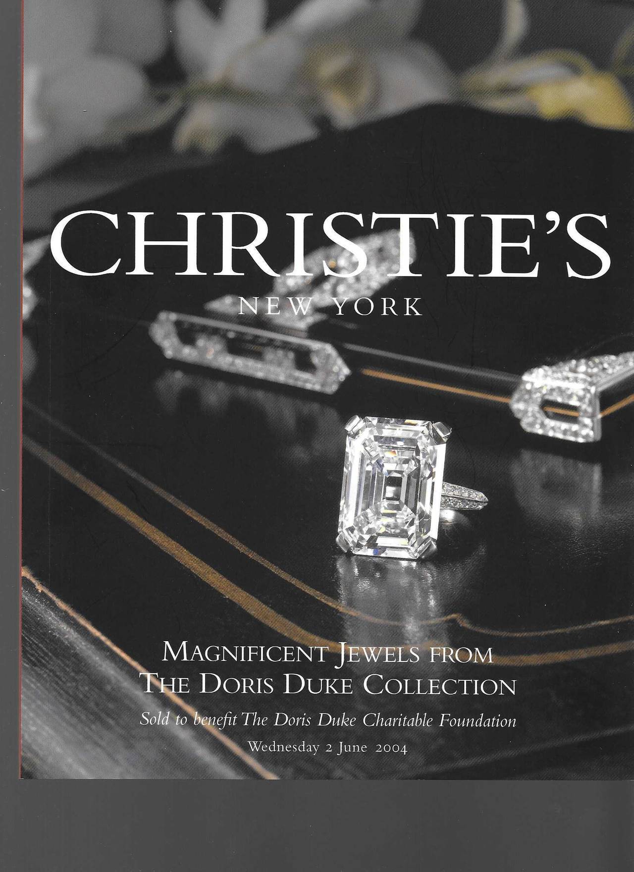 A boxed set of three volumes of auction catalogues including-magnificent jewels, extraordinary private wine cellar, furniture and the decorative arts of the great 20th century American Philanthropist Doris Duke. With photographs and descriptions of