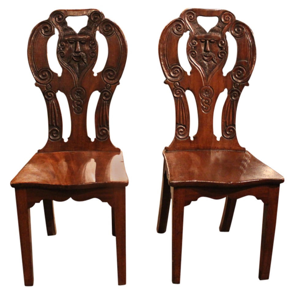 Pair Of Jacobean Hall Chairs With Shaped Seats, Tapered Legs, Pierced Carved Back For Sale