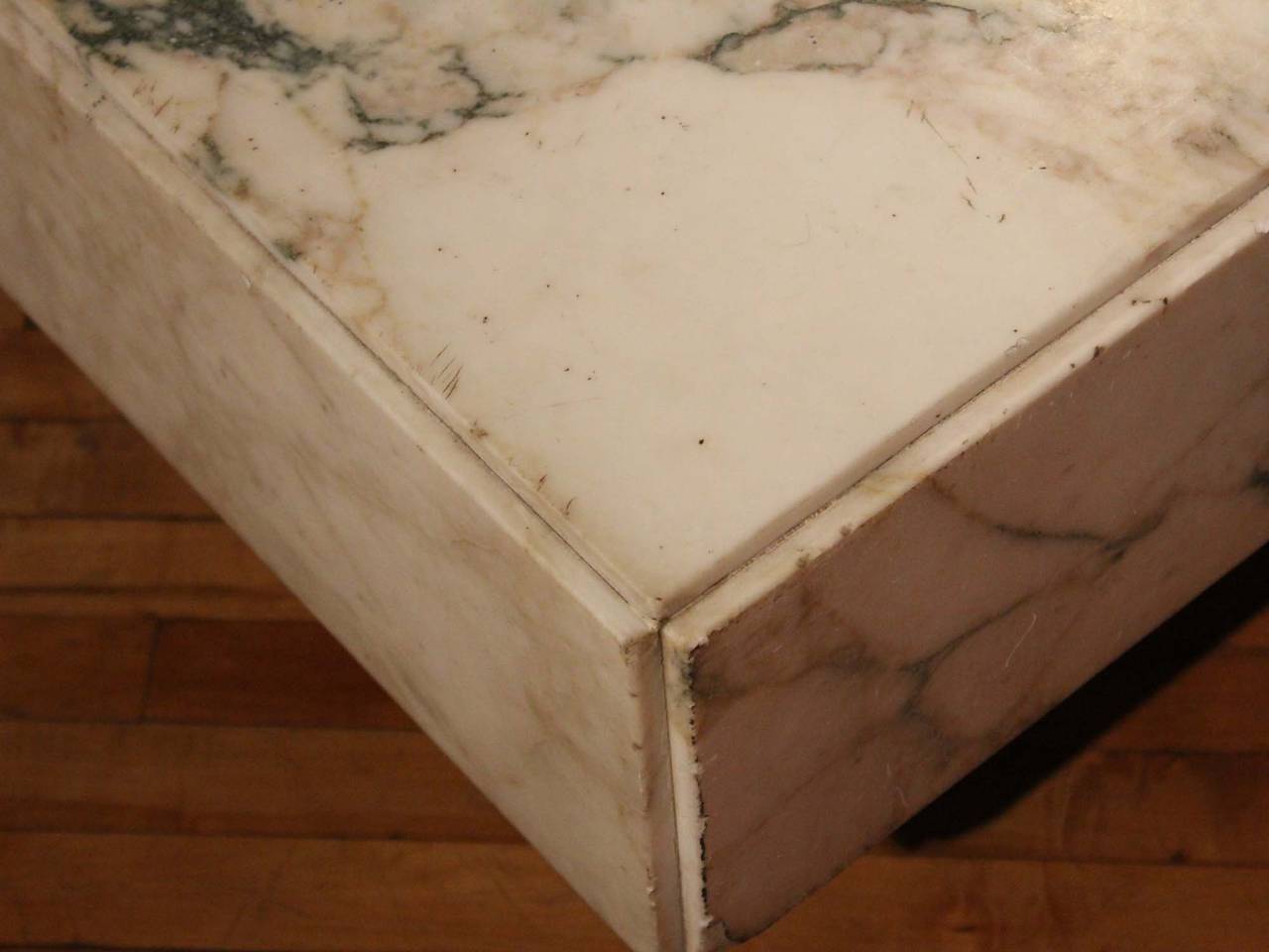Italian marble top and wooden base cocktail table.