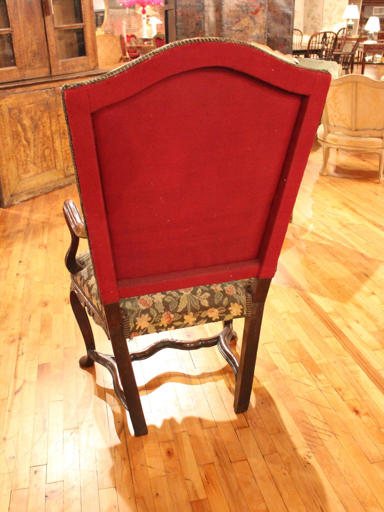 French walnut needlepoint armchair with shaped frame.