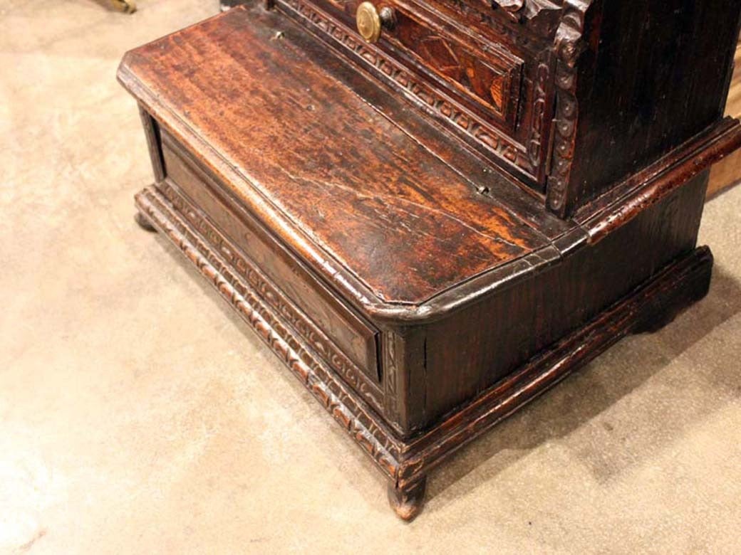 Italian Walnut Cupboard with scalloped accents and drawers