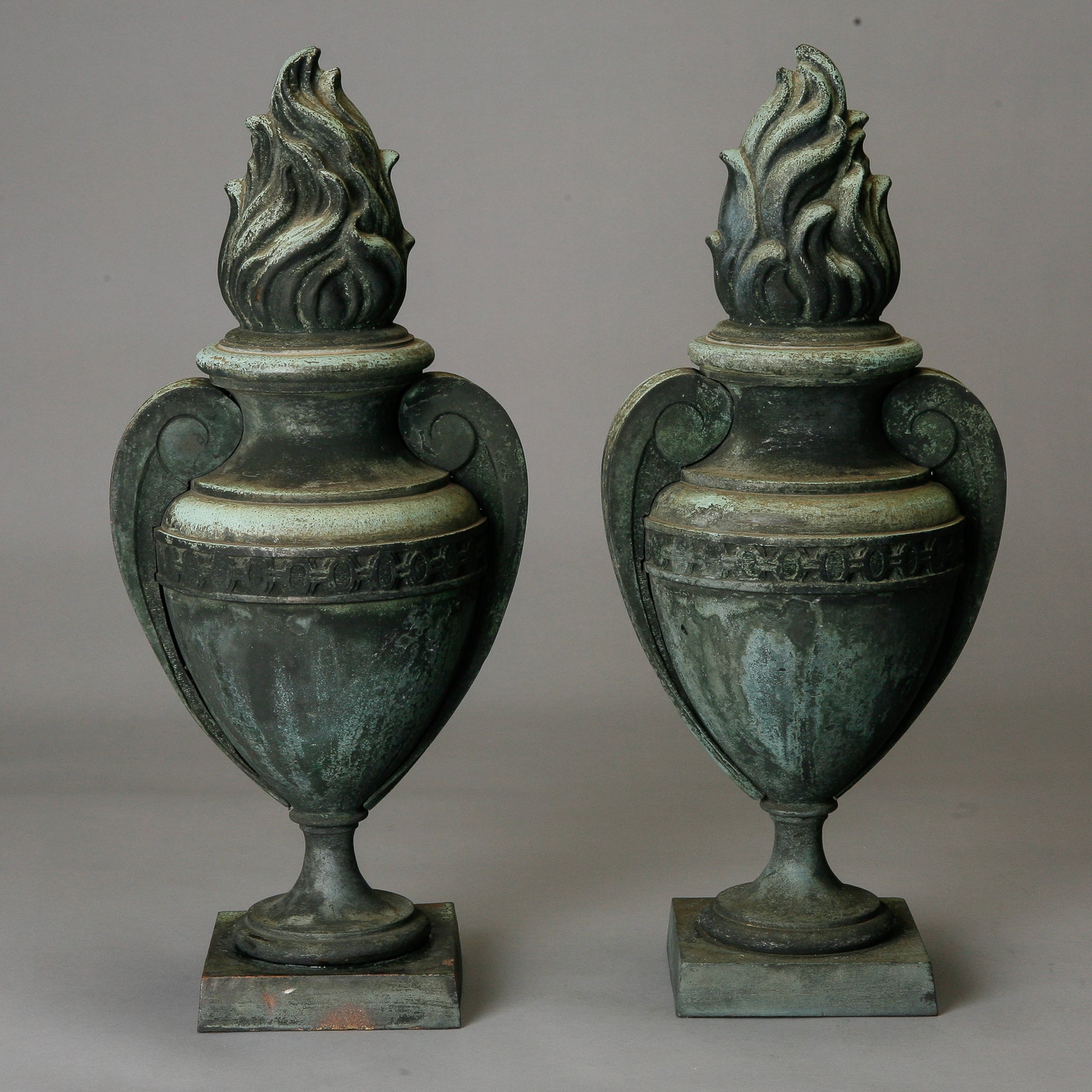 Pair of Tall Bronze Flame Urns
