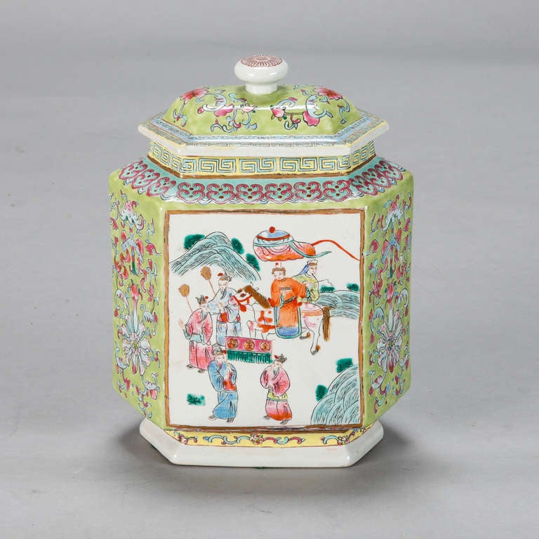 Circa 1880s six sided ginger jar with green background and ceremonial scenes on large panels.