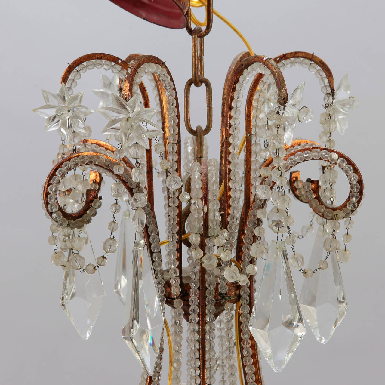 Italian chandelier with gilt metal frame, twelve candle style lights, embellished with large faceted drops and a lot of crystal beading, circa 1900. New electrical wiring for US standards.
# of sockets: 12
Socket type: Candelabra.