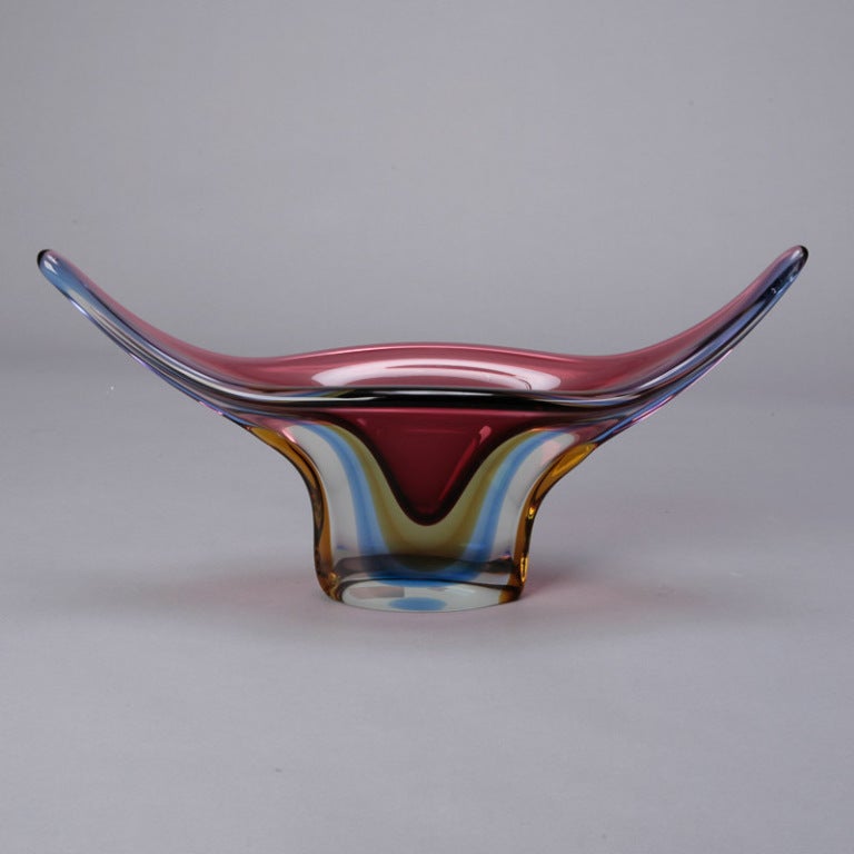 Circa 1960s Flavio Poli Murano glass sommerso centerpiece bowl with dramatic pulled rim in stunning shades of amethyst, blue and amber. We also have a Flavio Poli vase in similar colors and style. Please inquire.