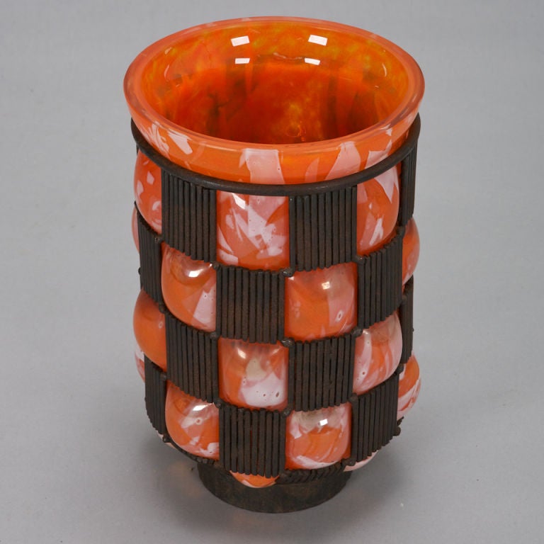 This large, vibrant orange and white marbled glass vase attributed to Daum (no signature or mark found) has a dramatic checkerboard pattern metal surround.