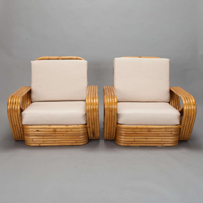 Pair circa 1940s Paul Frankl style five strand rattan pretzel armchairs. New foam cushions covered in muslin - ready for the fabric of your choice. Sold and priced as a pair. We also have a coordinating 3 seat sectional sofa and side table. Please