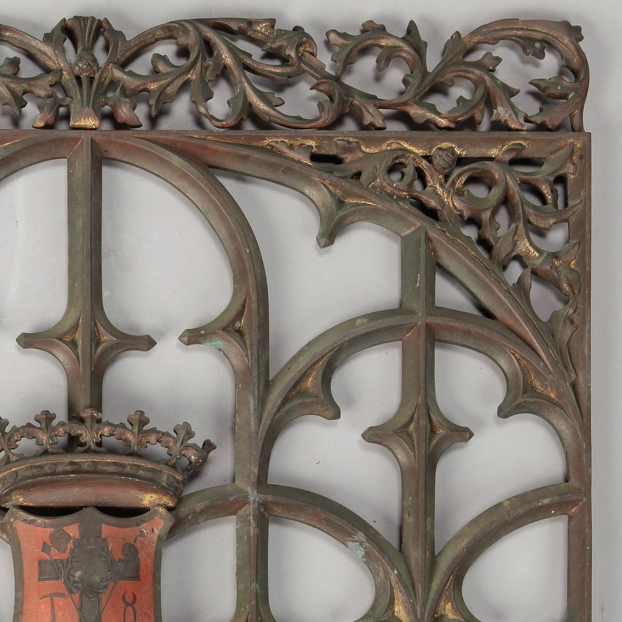 Found in France, this circa 1880s gothic iron and bronze open work decorative grate or grill was probably first used to protect or cover a window or vent. Beautifully rendered detail work and patina.