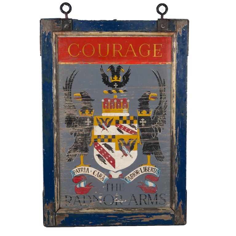 This English pub sign from The Radnor Arms features a coat of arms with ravens. Made to hang free, it is painted on both sides. Additional pub signs can be found on our website: www.judyfrankelantiques.com