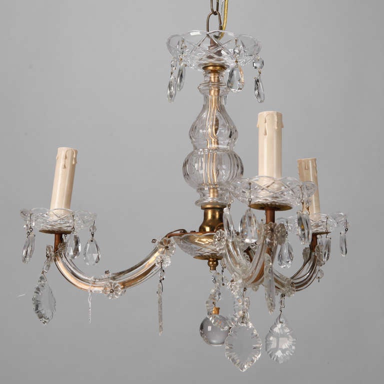 Circa 1930s Maria Theresa style chandelier with three candle arms, large faceted crystal drops