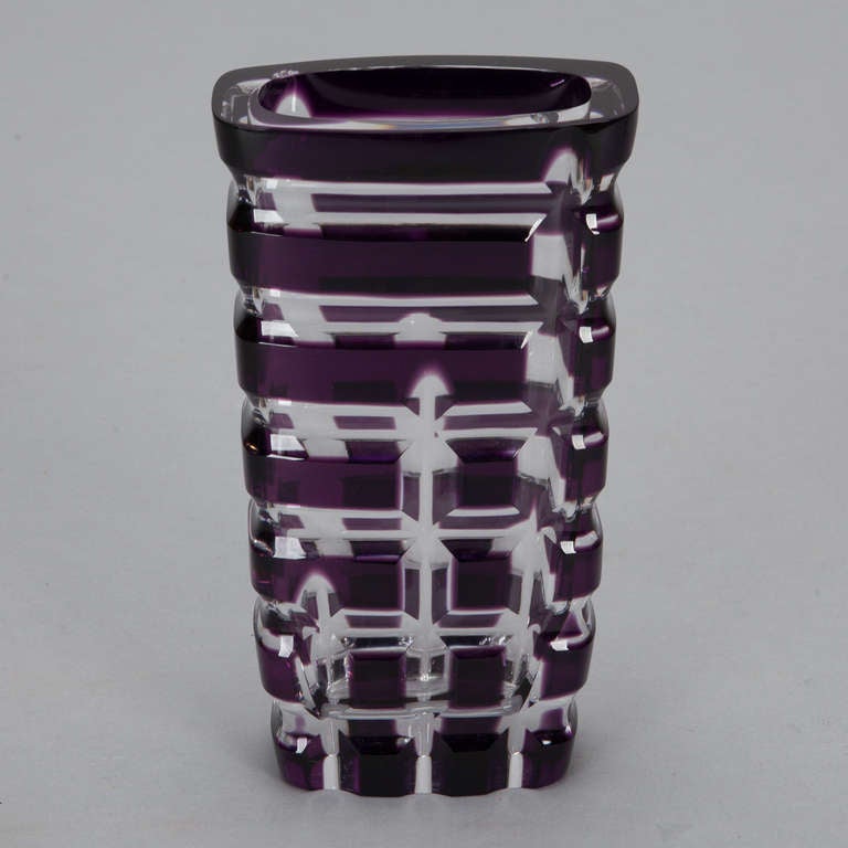 Circa 1930s Art Deco era amethyst cut to clear Czech vase with wide ribbed surface texture.