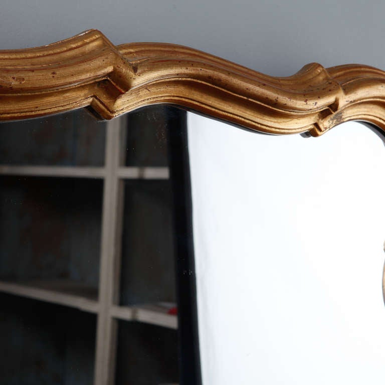 scalloped wood mirror