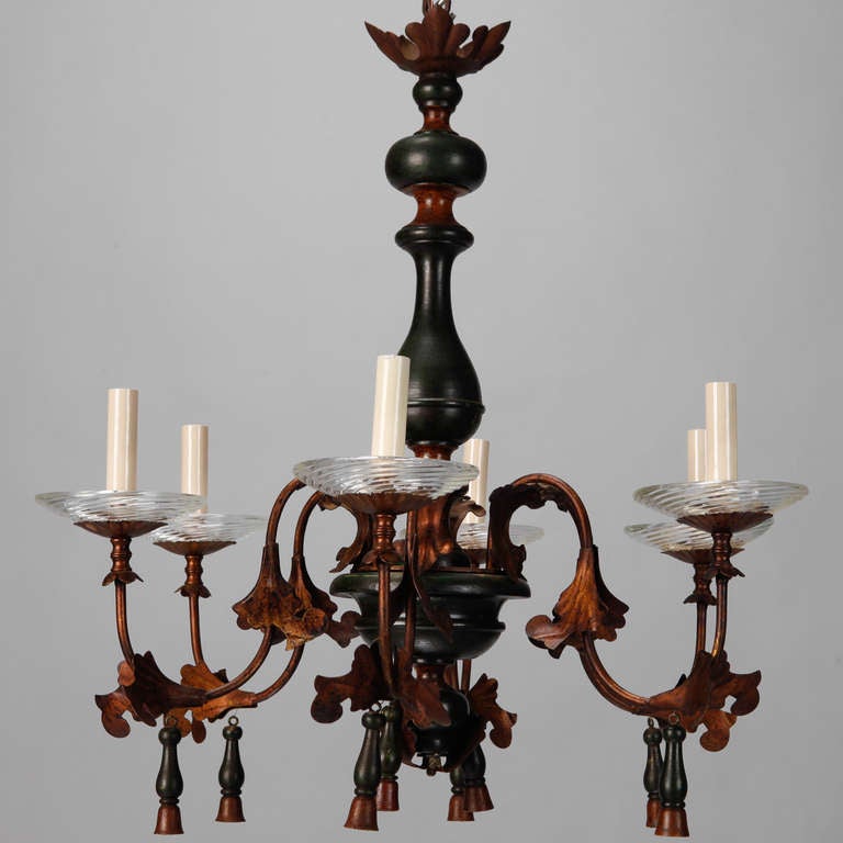 Circa 1920s Italian wood and gilt metal 6 arm chandelier with wood tassels & ribbed glass bobeches.
# of Sockets:  6
Socket Type:  Candelabra