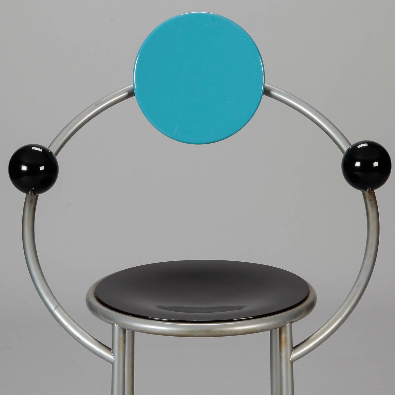 Iconic First Chair designed by Michele de Lucchi for Memphis Milano in 1982. Founded by Ettore Sottsass and other architects and designers in Milan, the whimsical furniture and decorative items produced by this design firm in the 1980s is now sought