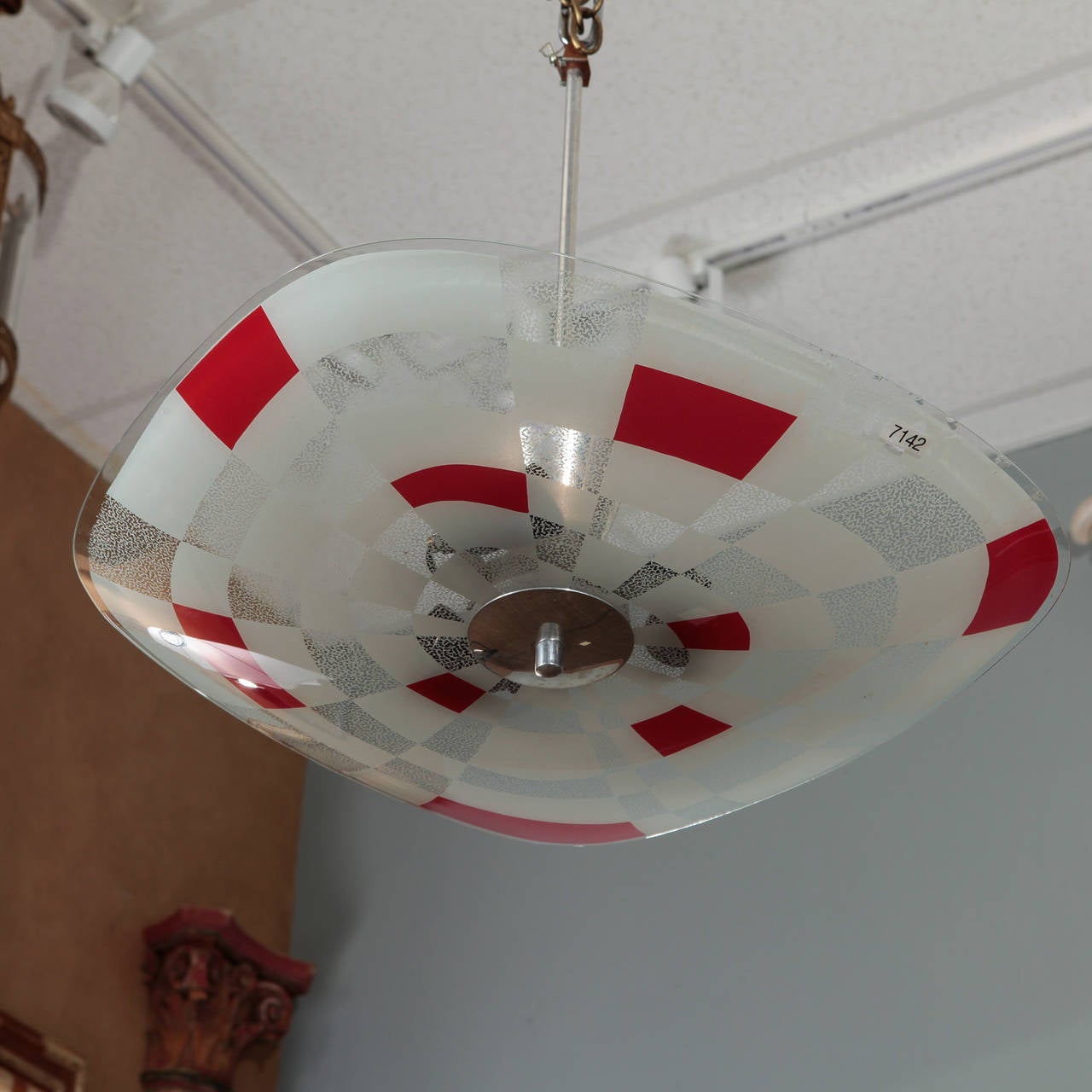 European Op Art ceiling fixture (we believe this is German) with geometric pattern in clear, white satin and red glass with silver tone metal hardware, circa late 1970s-early 1980s. New wiring for US electrical standards.
# of sockets: